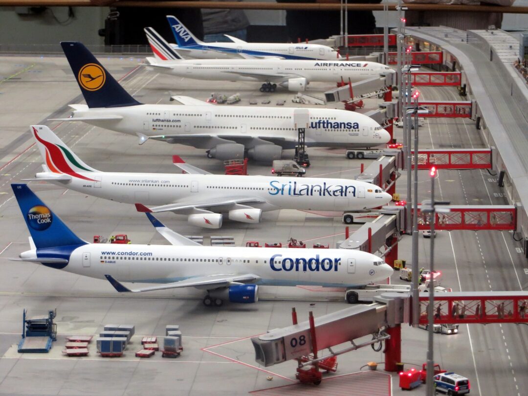 Airplanes waiting to board passengers